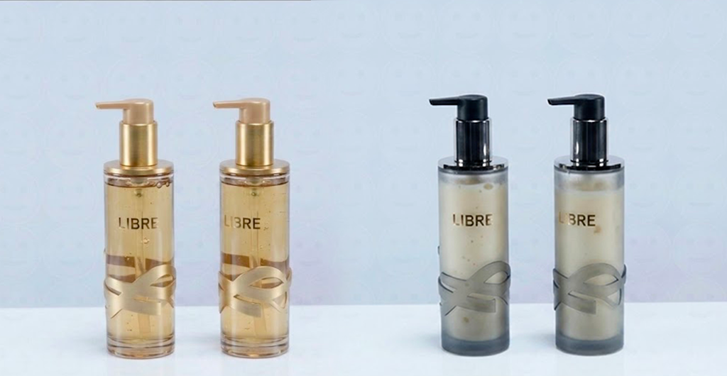 Gels de douche & laits corps LIBRE — versions or ambré et fumé gunmetal, monogramme et signature or